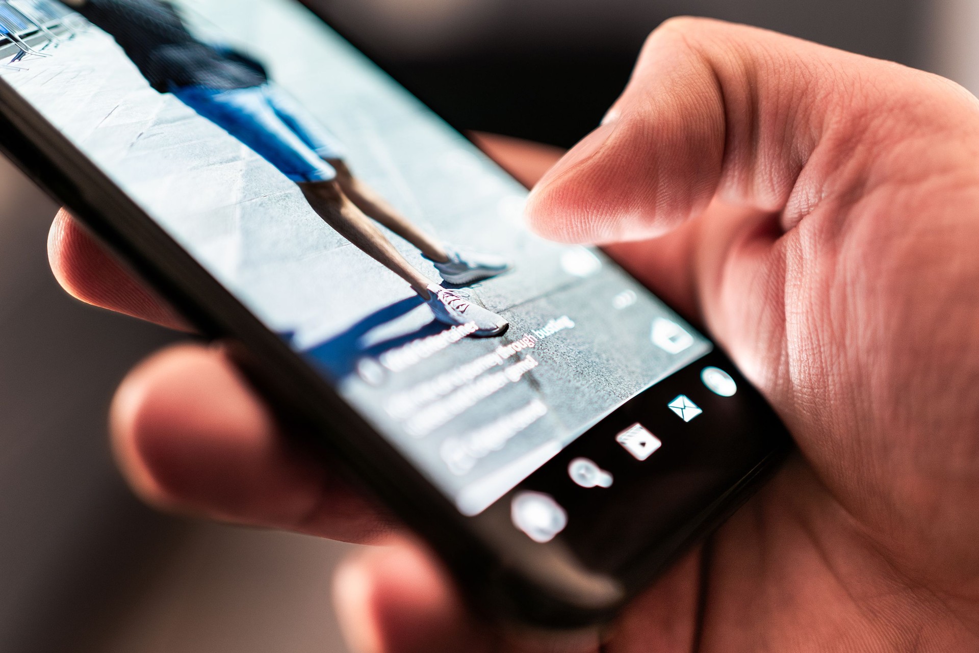 Short viral video on social media. Trend reel content in phone screen. App and platform for clips, live streaming or promotion campaign. Watching digital entertainment online.